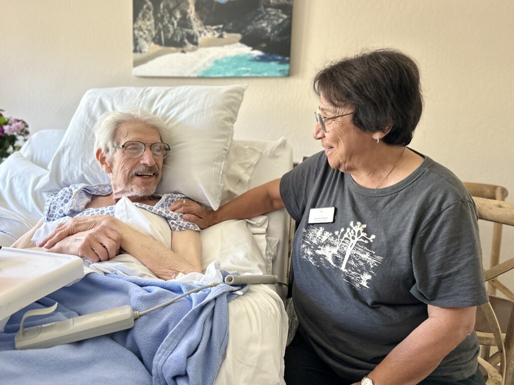 Lourdes with a patient in Mission House